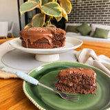 Cozy Cake Matilda Cake – slice of chocolate cake served on a plate
